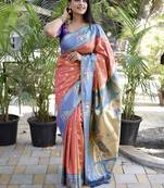 Coral paithani silk blend saree with contrast border & zari floral weaving