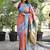 Coral paithani silk blend saree with contrast border & zari floral weaving