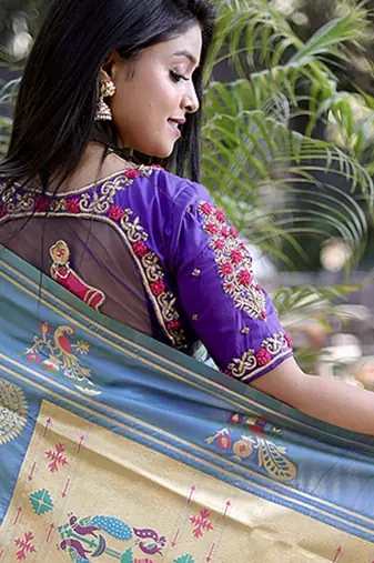 Coral paithani silk blend saree with contrast border & zari floral weaving