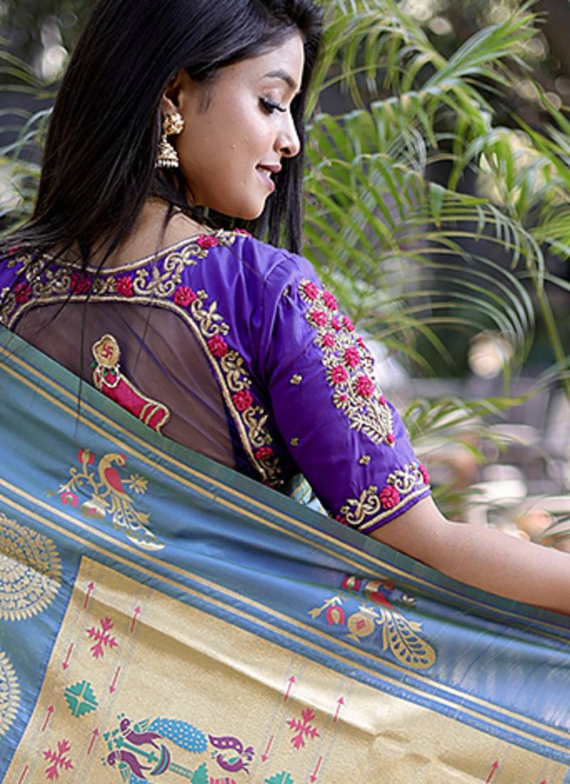 Coral paithani silk blend saree with contrast border & zari floral weaving
