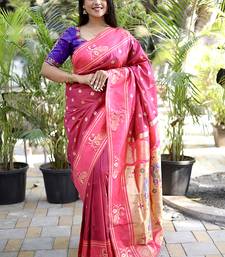 Magenta pink paithani silk blend saree with contrast border & zari floral weaving