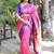 Rani pink paithani silk blend saree with contrast border & zari floral weaving