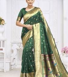 Dark green paithani silk blend saree with gold zari border & peacock pallu