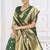 Dark green paithani silk blend saree with gold zari border & peacock pallu