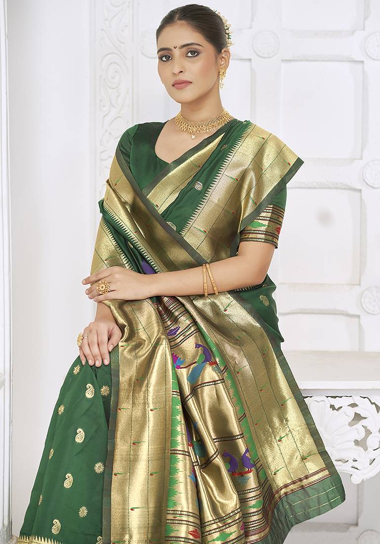 Dark green paithani silk blend saree with gold zari border & peacock pallu