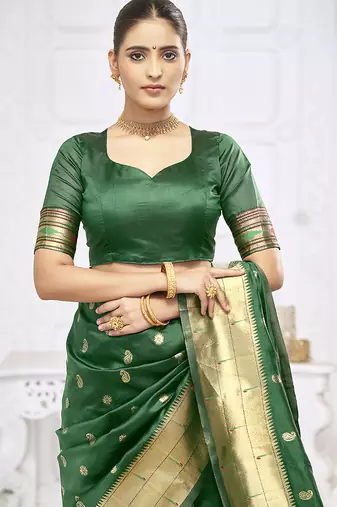 Dark green paithani silk blend saree with gold zari border & peacock pallu