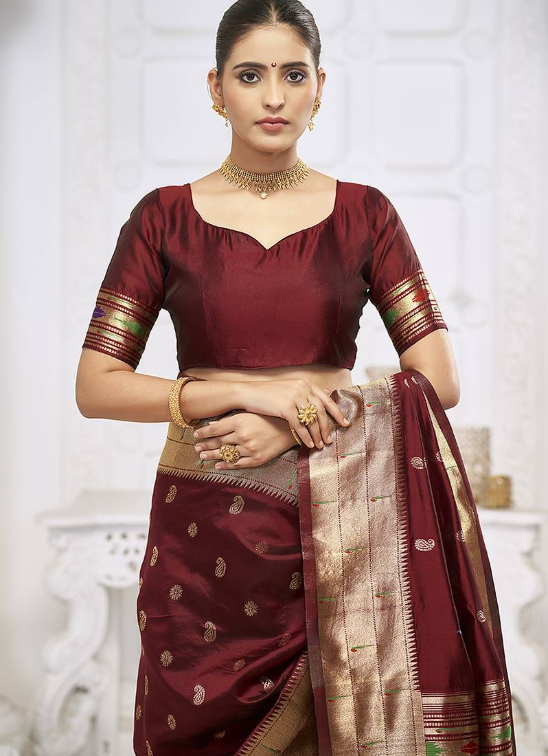 Maroon paithani silk blend saree with gold zari border & peacock pallu