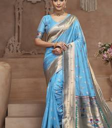 Sky blue paithani silk blend saree with gold zari border & peacock pallu