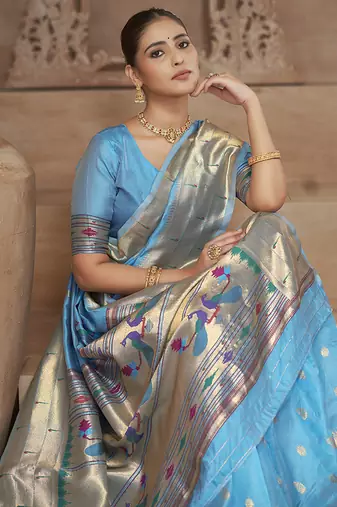 Sky blue paithani silk blend saree with gold zari border & peacock pallu
