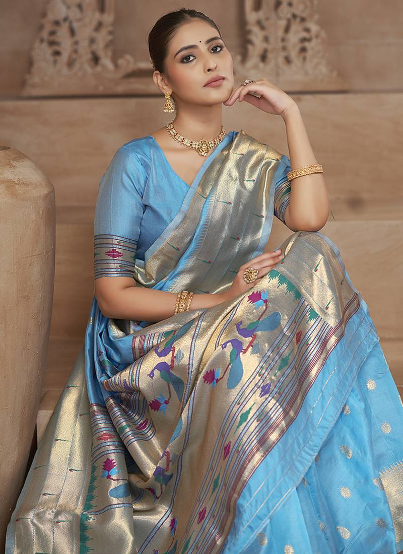 Sky blue paithani silk blend saree with gold zari border & peacock pallu