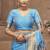 Sky blue paithani silk blend saree with gold zari border & peacock pallu