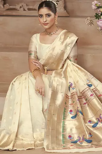 Off white paithani silk blend saree with gold zari border & peacock pallu