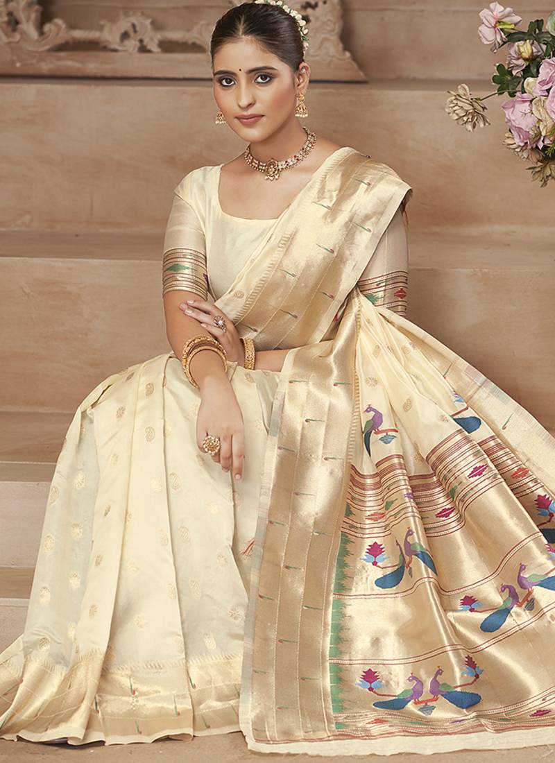 Off white paithani silk blend saree with gold zari border & peacock pallu