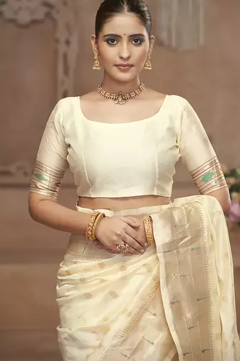 Off white paithani silk blend saree with gold zari border & peacock pallu