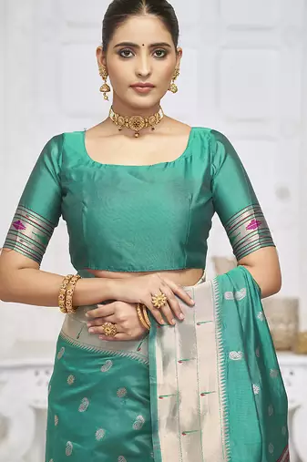 Turquoise paithani silk blend saree with gold zari border & peacock pallu