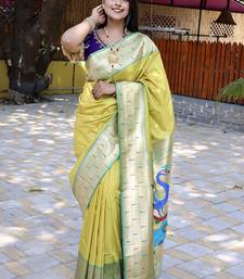 Lime yellow silk blend paithani saree with peacock pallu, golden zari border