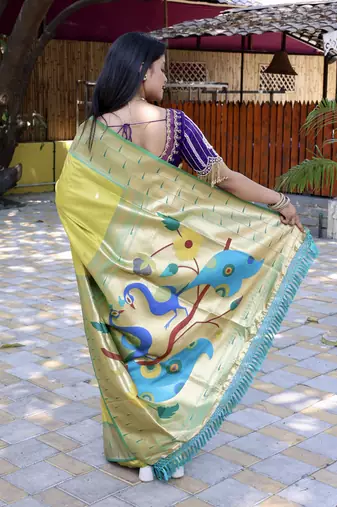 Lime yellow silk blend paithani saree with peacock pallu, golden zari border