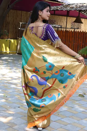 Aqua blue silk blend paithani saree with peacock pallu, golden zari border