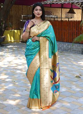 Aqua blue silk blend paithani saree with peacock pallu, golden zari border 3
