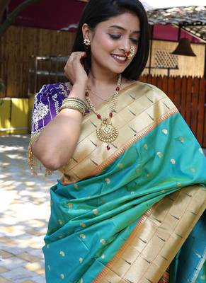 Aqua blue silk blend paithani saree with peacock pallu, golden zari border 4
