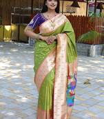 Parrot green silk blend paithani saree with peacock pallu, golden zari border