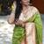 Parrot green silk blend paithani saree with peacock pallu, golden zari border