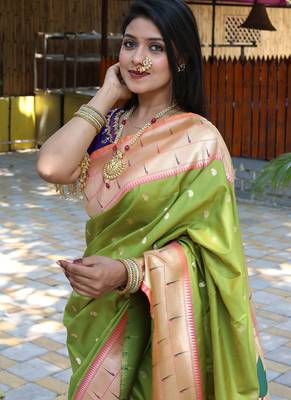 Parrot green silk blend paithani saree with peacock pallu, golden zari border 4