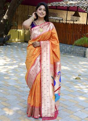Orange silk blend paithani saree with peacock pallu, golden zari border 1