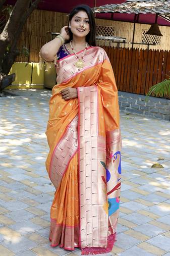 Orange silk blend paithani saree with peacock pallu, golden zari border