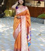 Orange silk blend paithani saree with peacock pallu, golden zari border