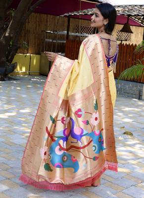 Orange silk blend paithani saree with peacock pallu, golden zari border 2