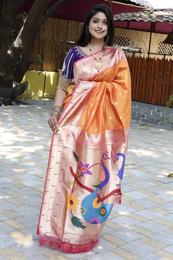 Orange silk blend paithani saree with peacock pallu, golden zari border