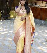 Cream silk blend paithani saree with peacock pallu, golden zari border