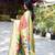 Salmon pink silk blend paithani saree with peacock pallu, golden zari border