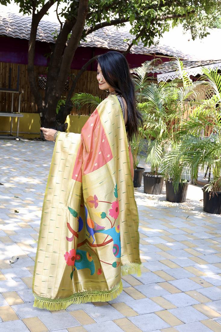 Salmon pink silk blend paithani saree with peacock pallu, golden zari border
