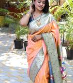 Peach silk blend paithani saree with peacock pallu, golden zari border