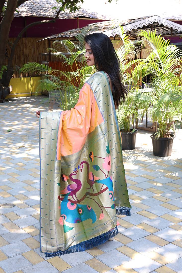 Peach silk blend paithani saree with peacock pallu, golden zari border
