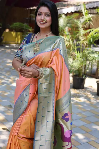 Peach silk blend paithani saree with peacock pallu, golden zari border