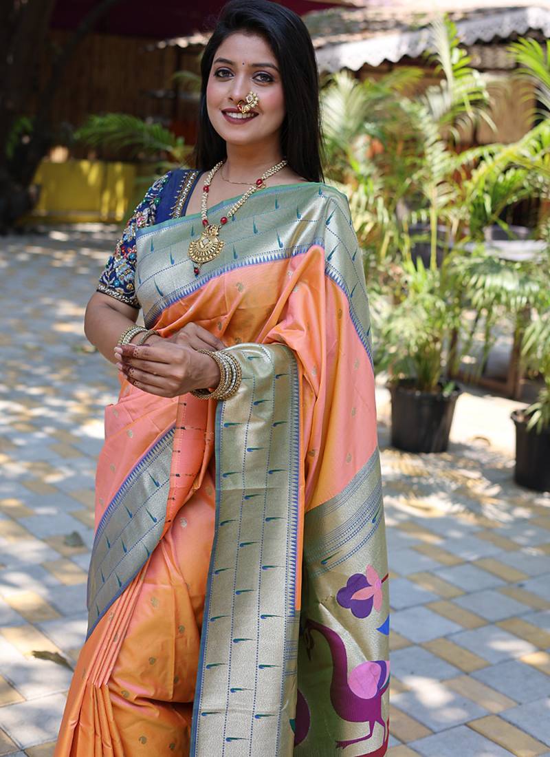 Peach silk blend paithani saree with peacock pallu, golden zari border