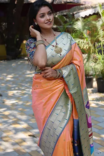 Peach silk blend paithani saree with peacock pallu, golden zari border