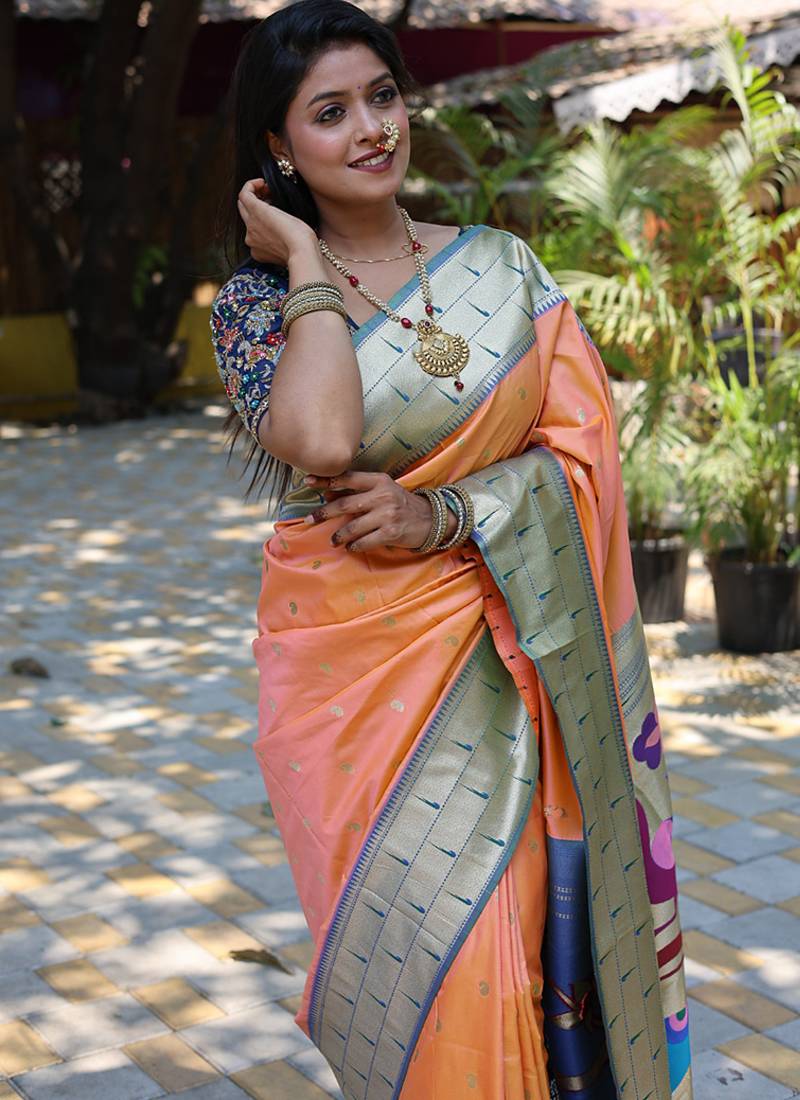 Peach silk blend paithani saree with peacock pallu, golden zari border