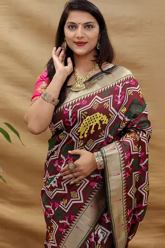 Maroon patola silk blend saree with bird motif paithani pallu and zari border