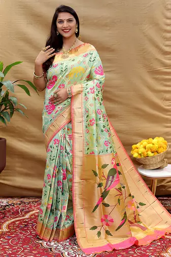 Mint green patola silk blend saree with bird motif paithani pallu and zari border