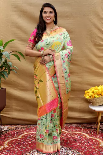 Mint green patola silk blend saree with bird motif paithani pallu and zari border