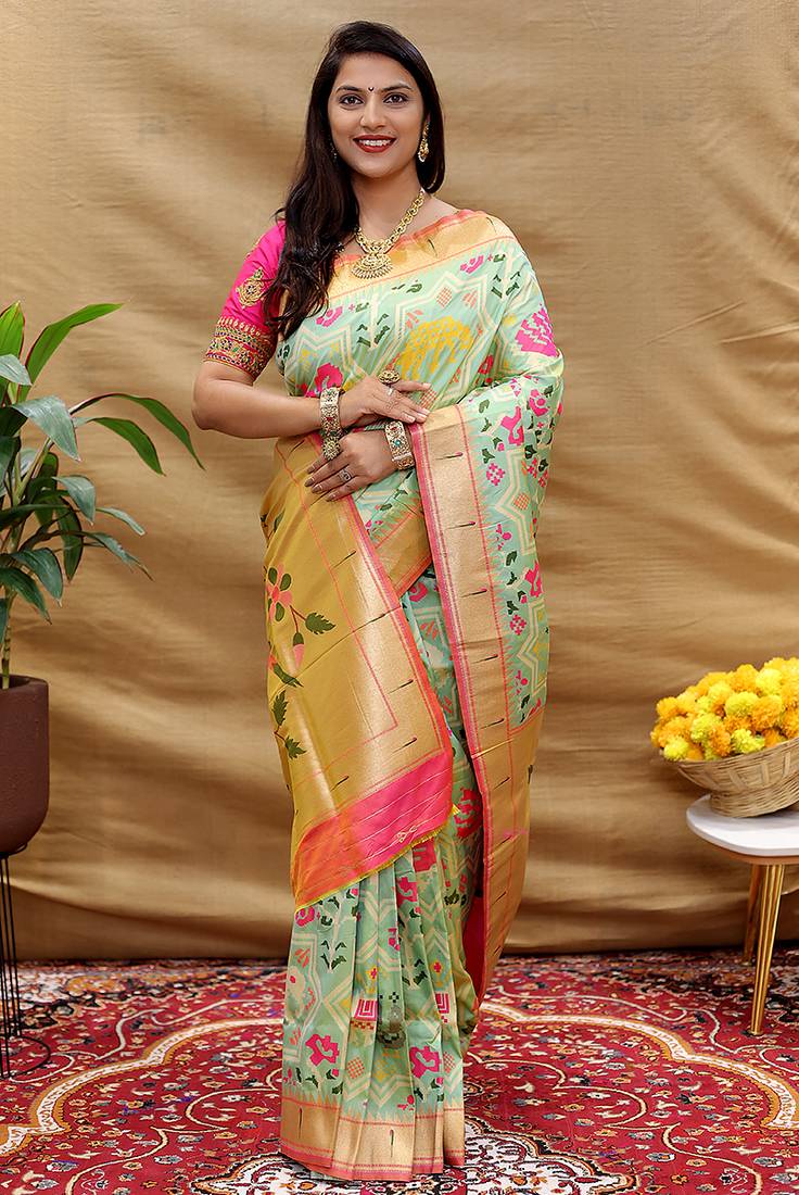 Mint green patola silk blend saree with bird motif paithani pallu and zari border