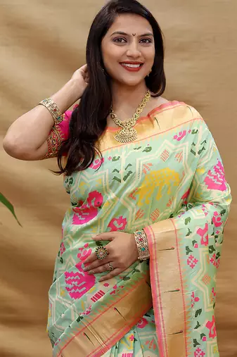 Mint green patola silk blend saree with bird motif paithani pallu and zari border