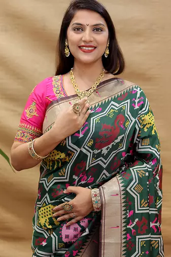 Dark green patola silk blend saree with bird motif paithani pallu and zari border
