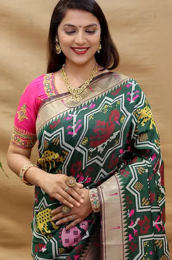 Dark green patola silk blend saree with bird motif paithani pallu and zari border