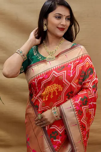 Red patola silk blend saree with bird motif paithani pallu and zari border