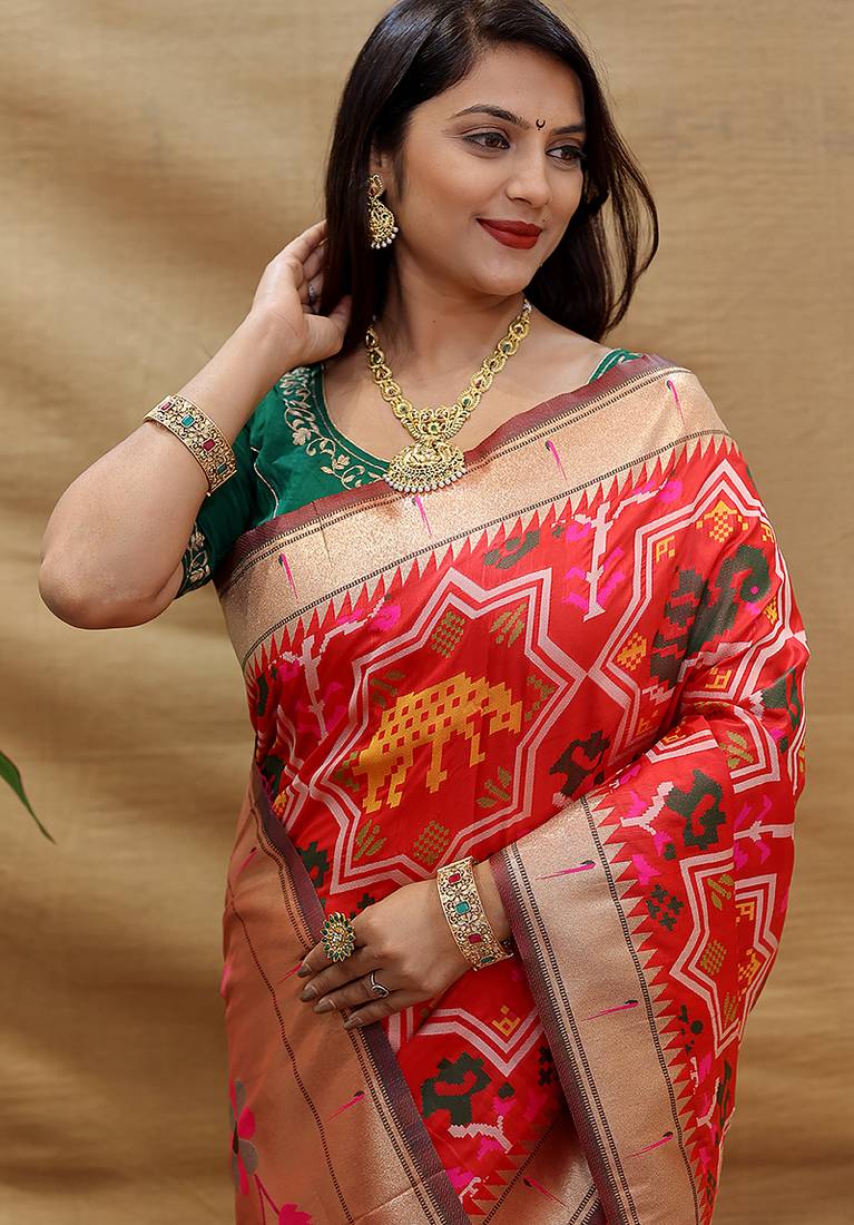 Red patola silk blend saree with bird motif paithani pallu and zari border